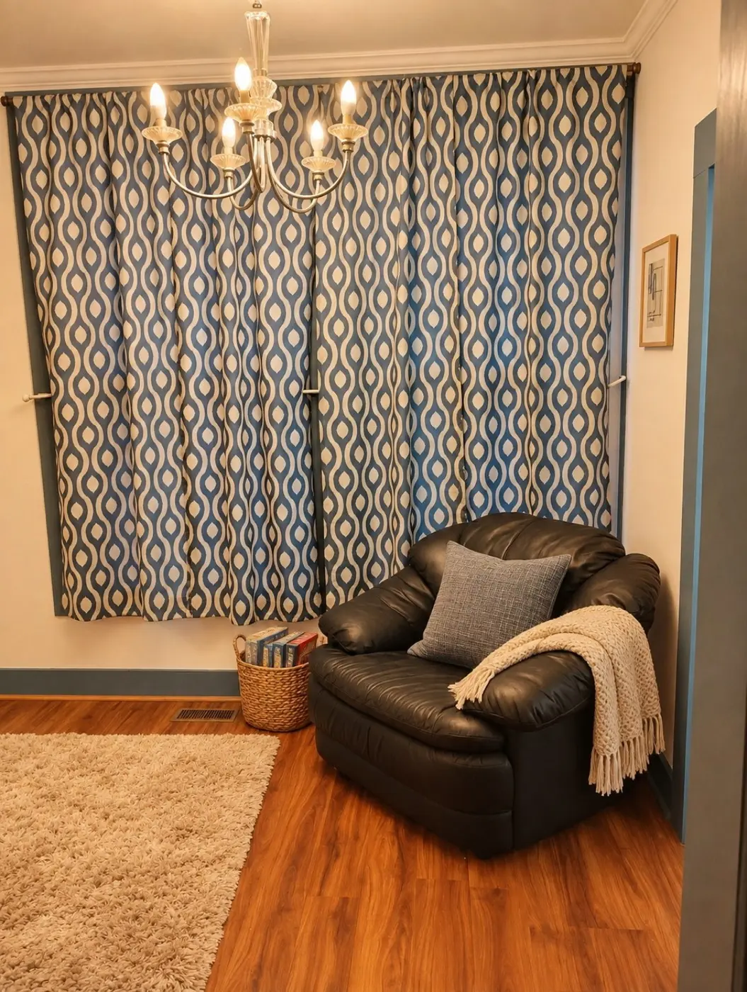 Temporary staged sitting nook with leather chair and patterned curtains
